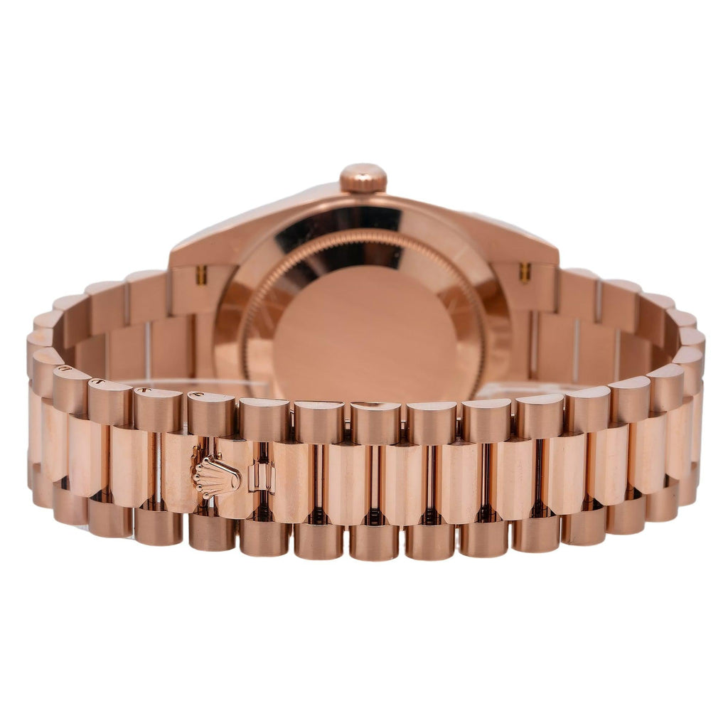 Pre-Owned Rolex Day-Date 40MM 228235 Black Baguette Diamond Dial Fluted Bezel 18K Rose Gold President Bracelet