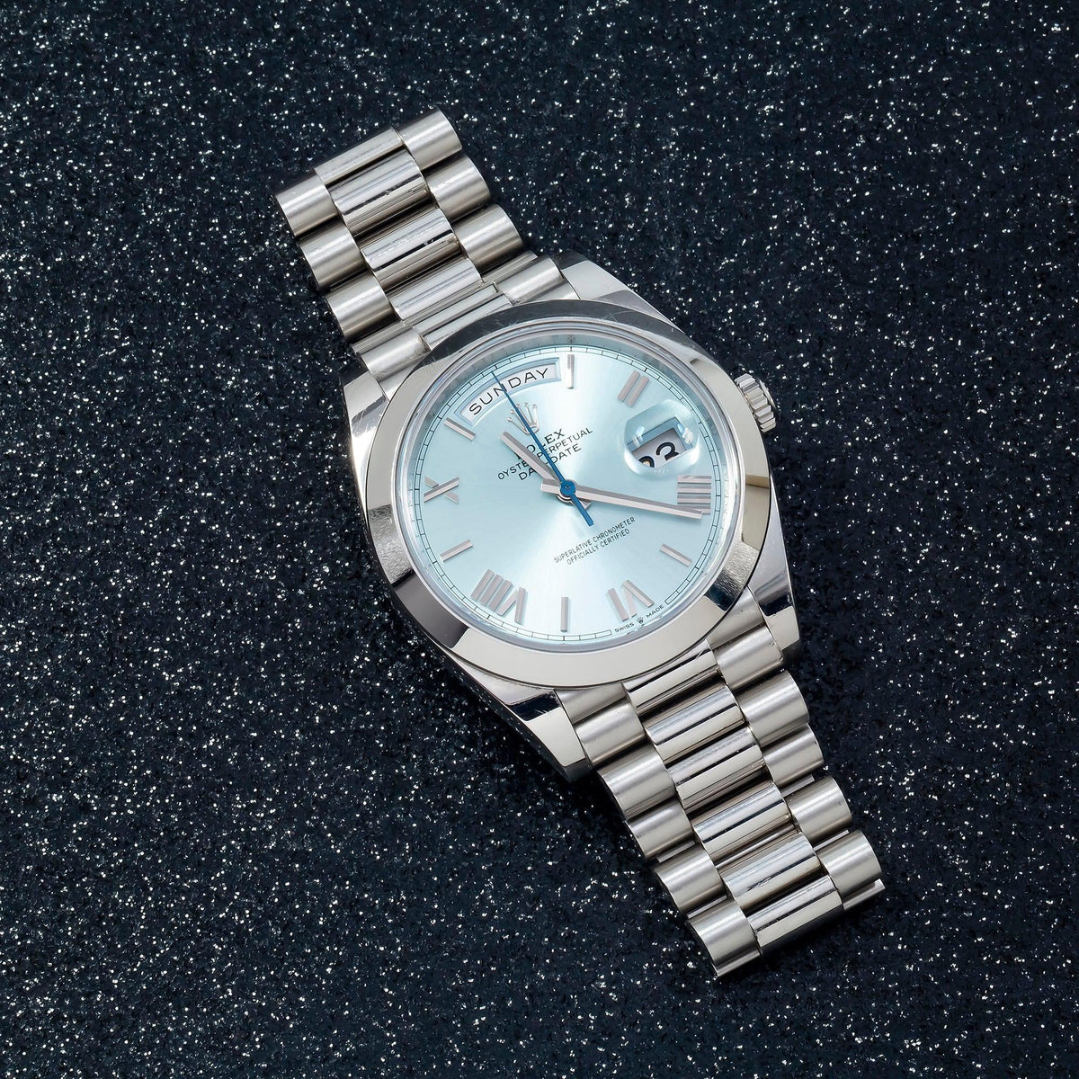 Pre-Owned Rolex Day-Date 40MM 228206 Ice Blue Roman Dial Platinum Smooth Bezel Platinum President Bracelet