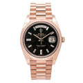 Pre-Owned Rolex Day-Date 40MM 228235 Black Baguette Diamond Dial Fluted Bezel 18K Rose Gold President Bracelet